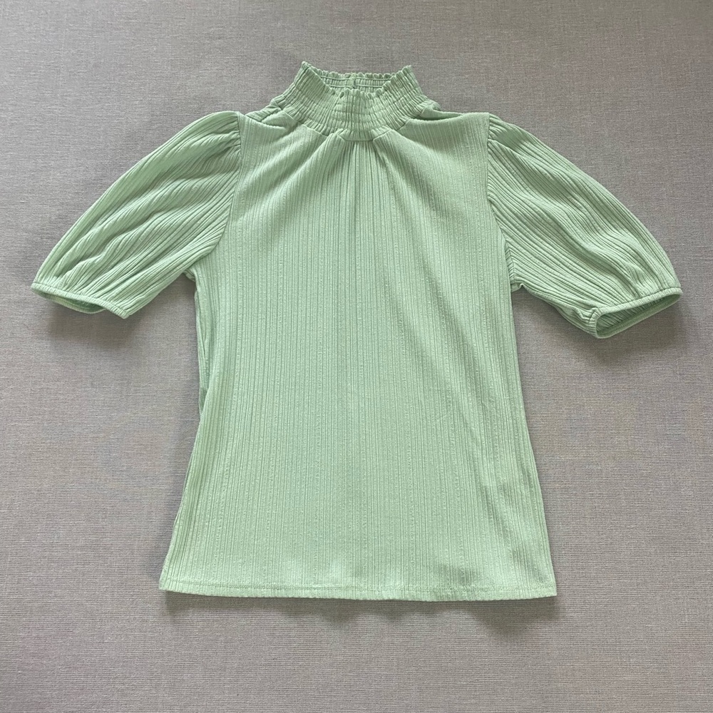 W5 pastel mint green top.
